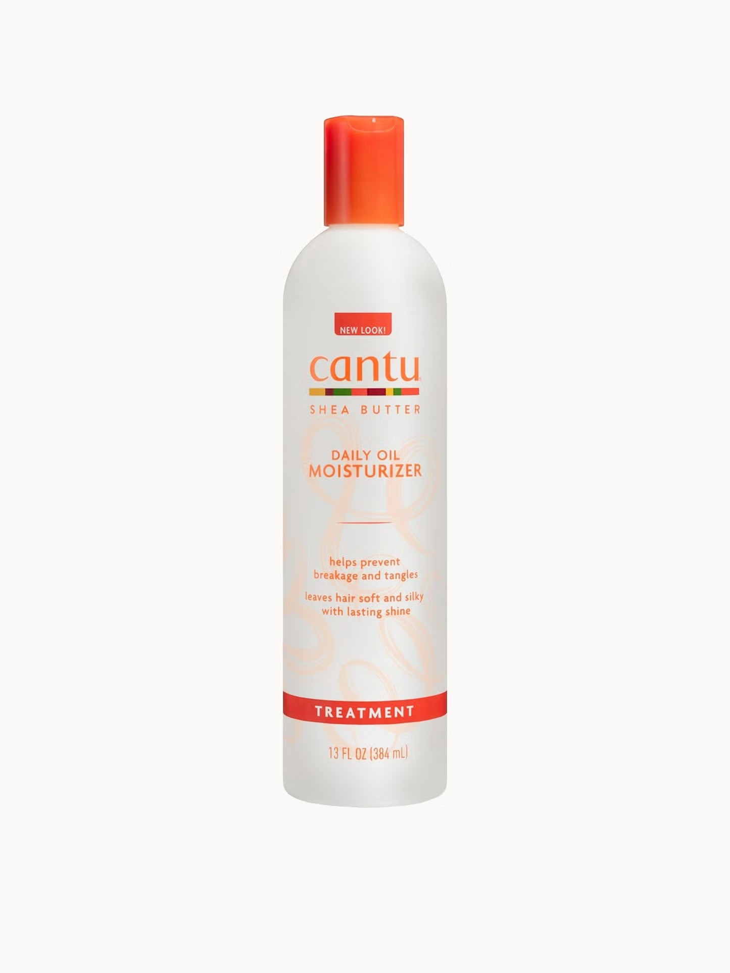 Cantu daily oil moisturizer bottle on a white background