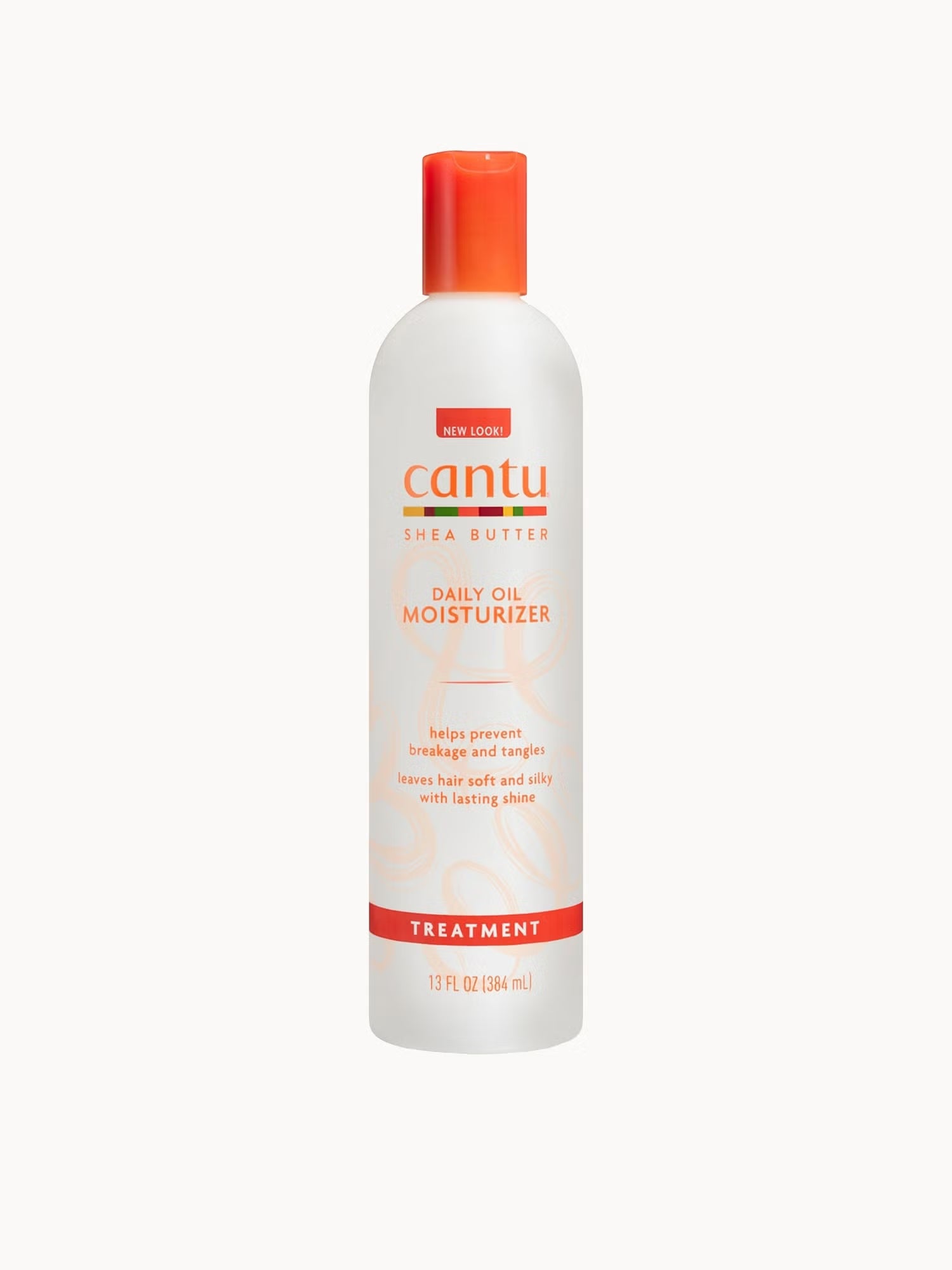 Cantu daily oil moisturizer bottle on a white background