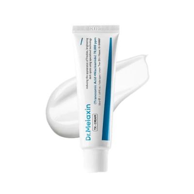 A white tube of Dr. Melaxin cream with blue text and a blue stripe, shown in front of a white cream smear on a white background.
