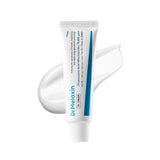 A white tube of Dr. Melaxin cream with blue text and a blue stripe, shown in front of a white cream smear on a white background.